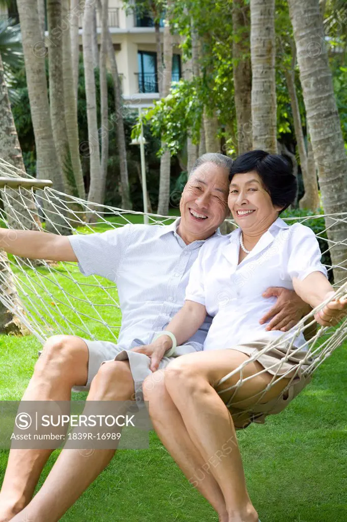 Portrait of a senior couple in a hammock