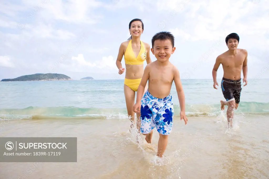 Portrait of a young family at the beach