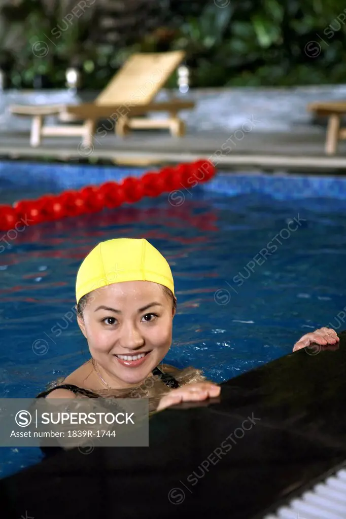 Woman In Swimming Pool