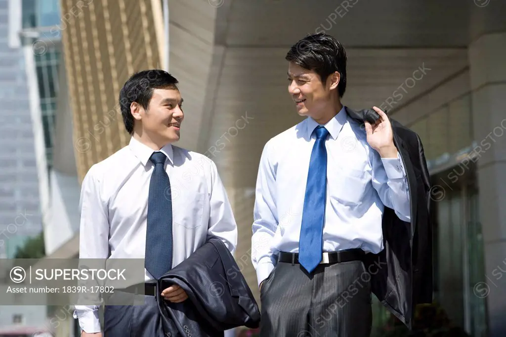 Businessmen in an urban scene