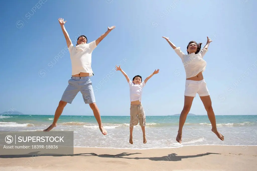 Family Jumping up with Joy