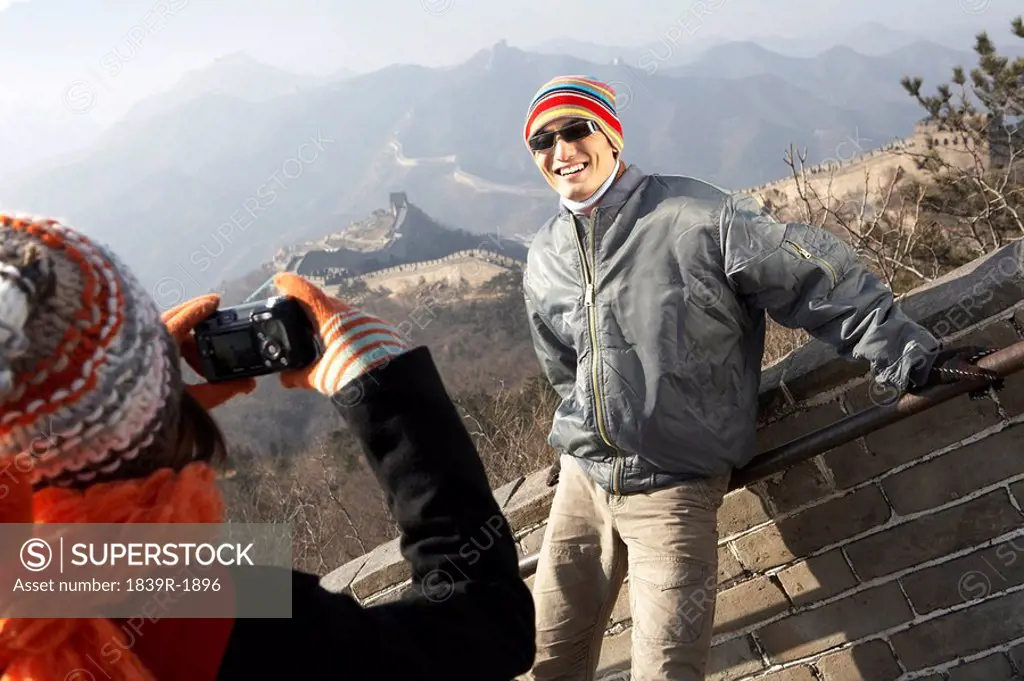 Young Couple On The Great Wall Of China