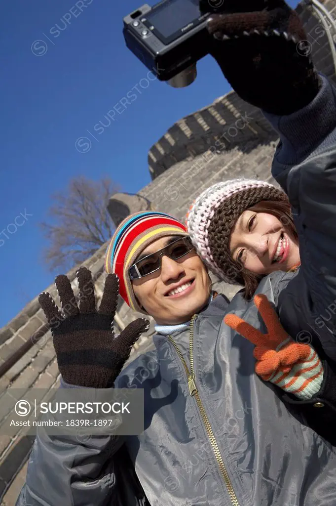 Young Couple On The Great Wall Of China