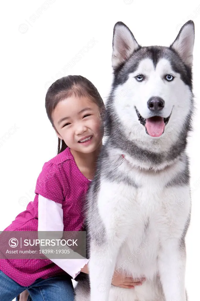 Cute girl with husky