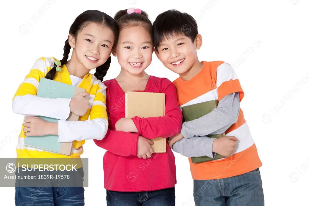 Happy students with books