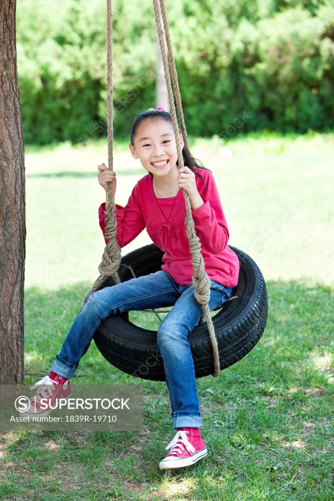 Young Girl Swinging