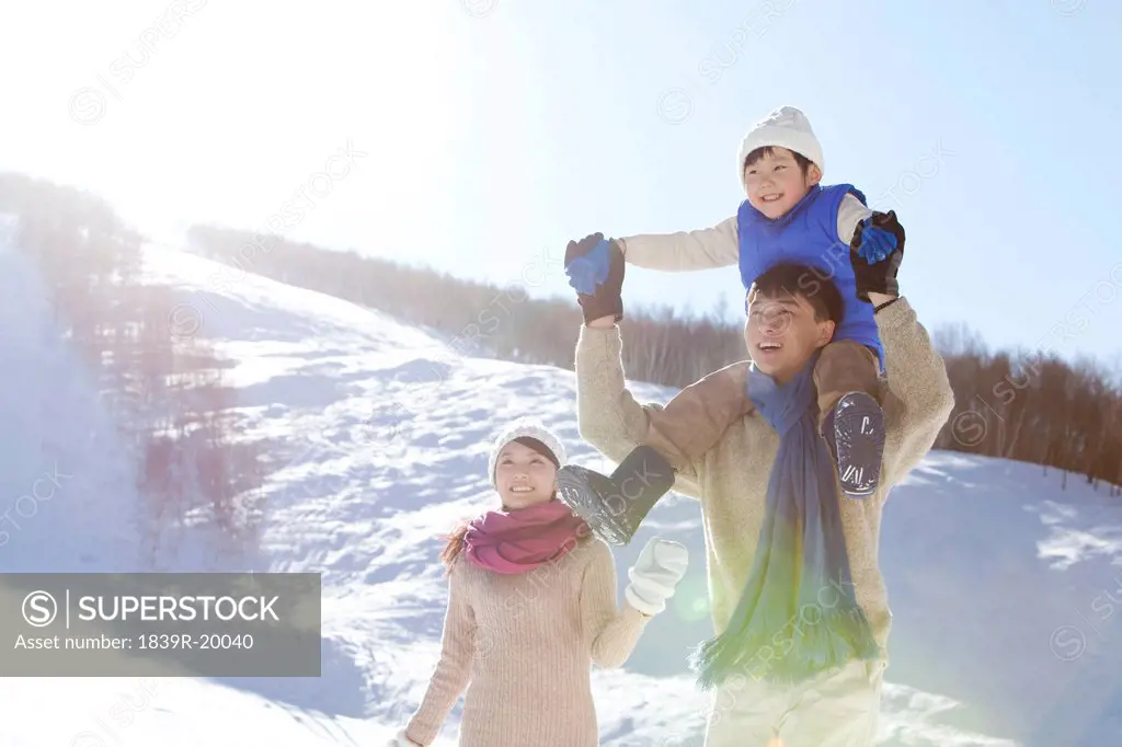 Family having fun in snow