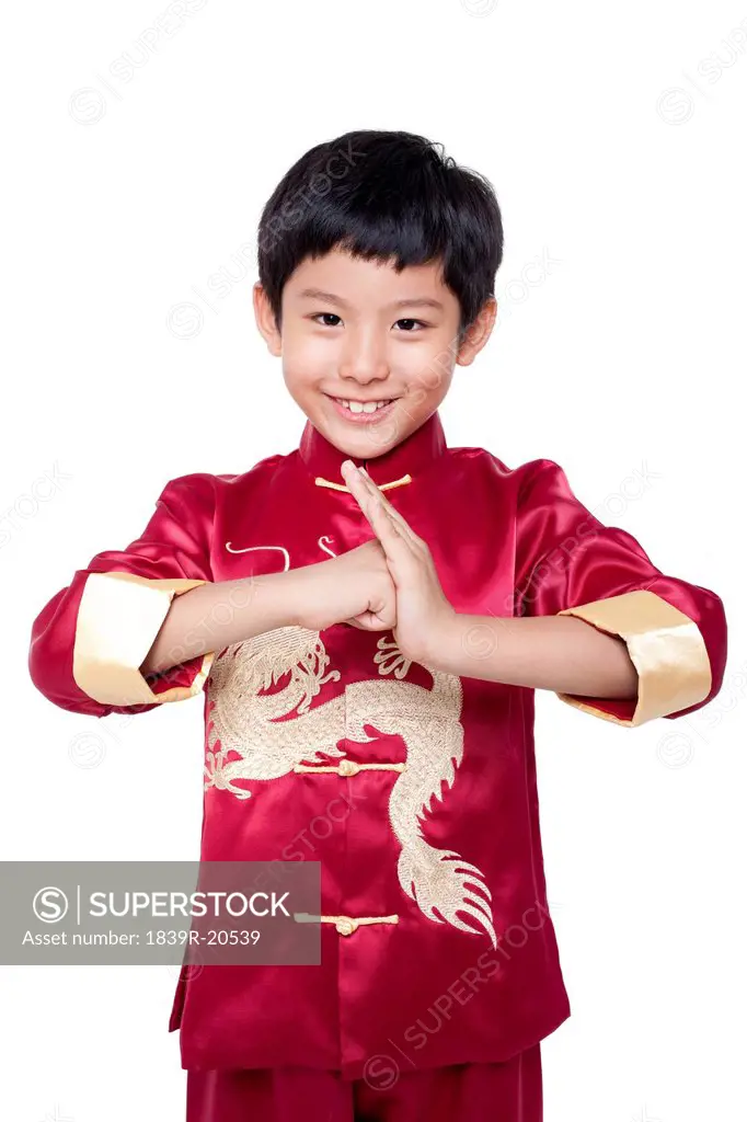 Young Boy Dressed In Traditional Chinese Clothing