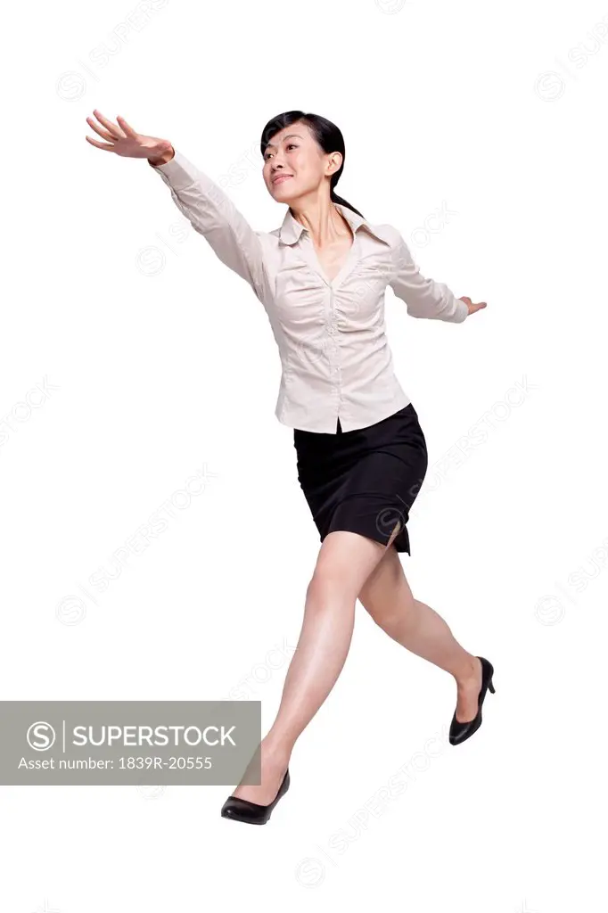 Excited Businesswoman Jumping
