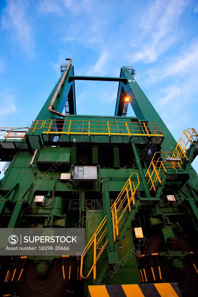 Low angle view of machinery at a shipping port