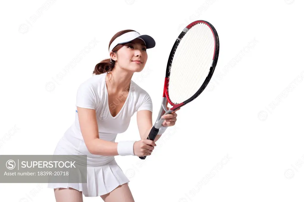 Young woman ready to play tennis