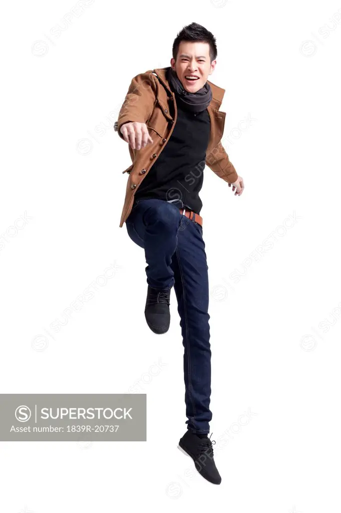 Young man jumping in mid_air