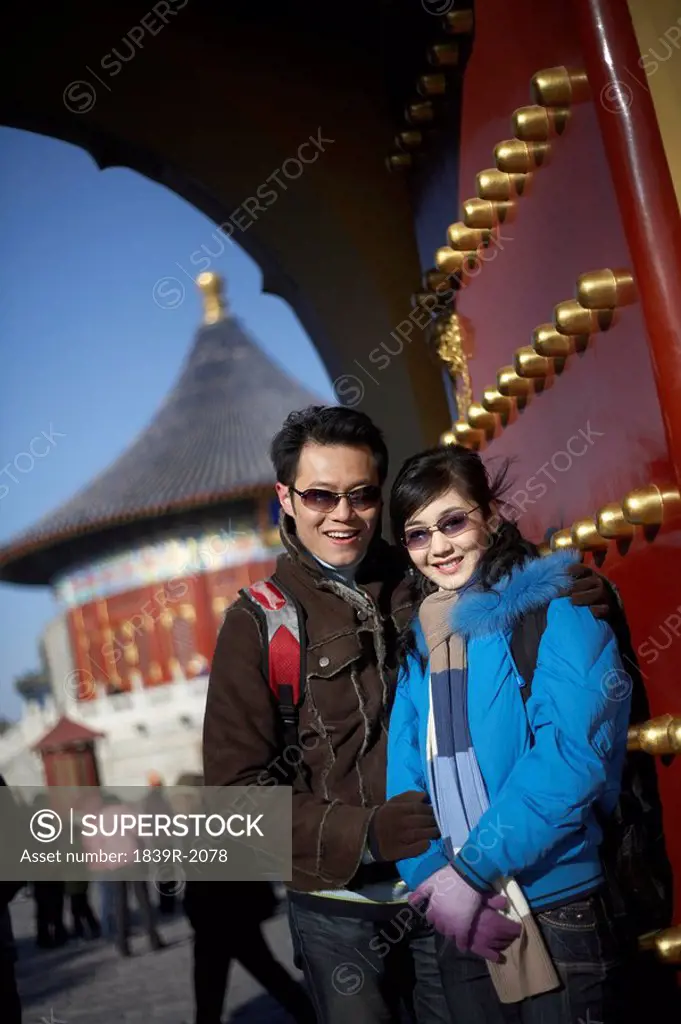 Couple Standing In The Temple of Heaven, Beijing, China