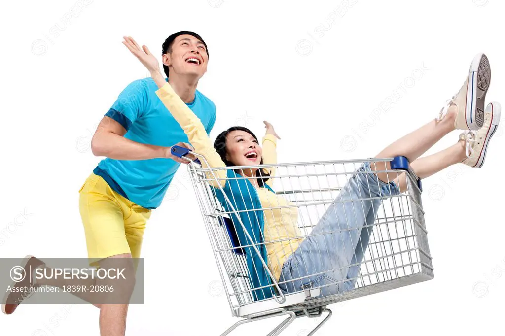 Young couple shopping in supermarket