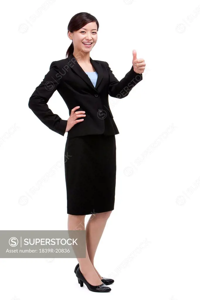Businesswoman doing thumbs_up