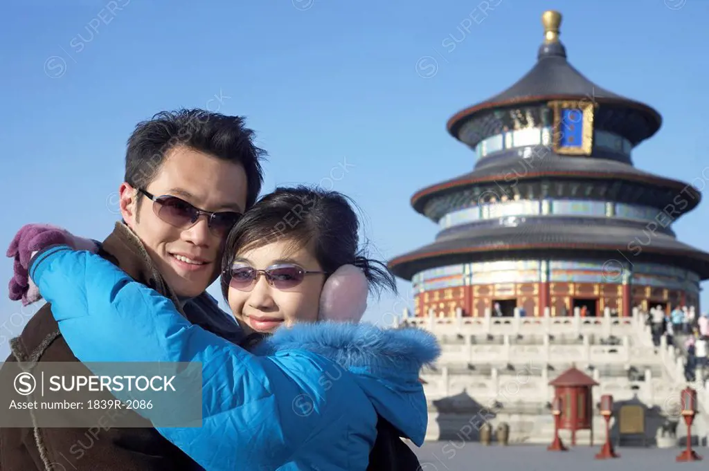 Couple Hugging In The Temple of Heaven, Beijing, China