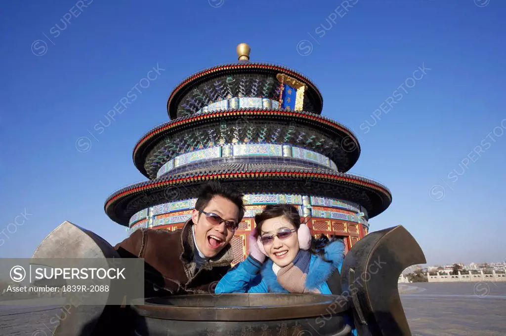 Couple Smiling In The Temple of Heaven, Beijing, China