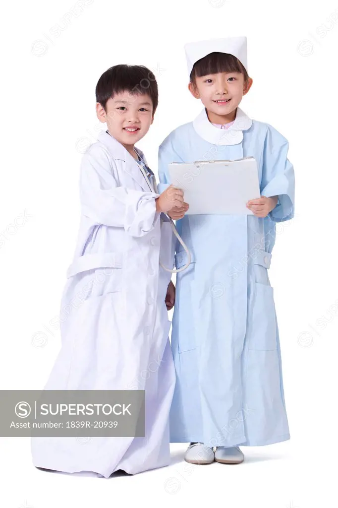 Boy and girl playing dress up