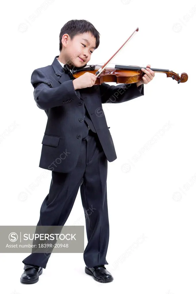 Little boy playing the violin