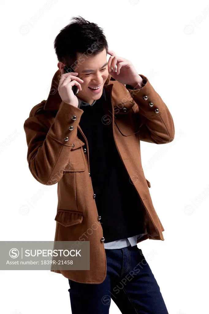 Stylish young man with moblie phone