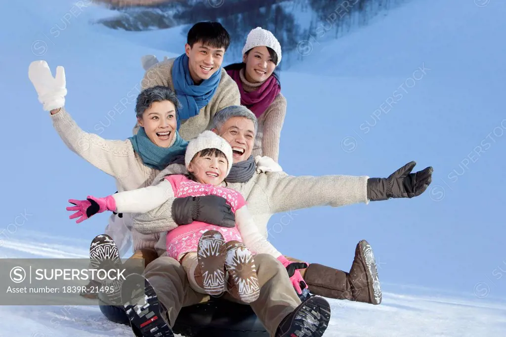 Big family having fun in snow