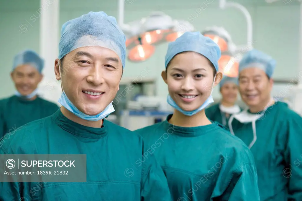 Portrait of a group of happy surgeons