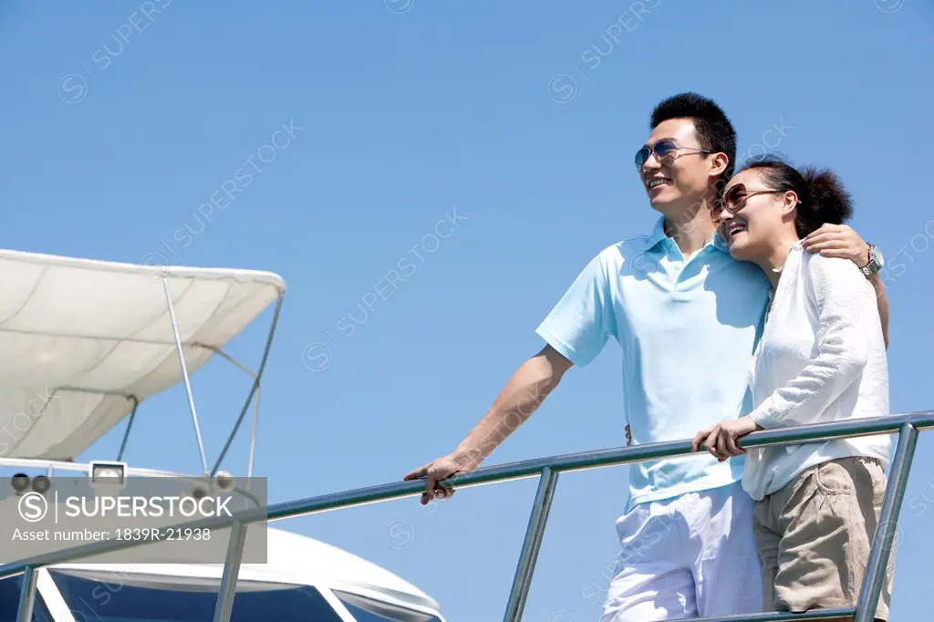 Couple Enjoying the View from the Yacht Deck