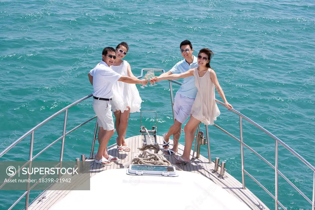 Friends Toasting Champagne on a Yacht