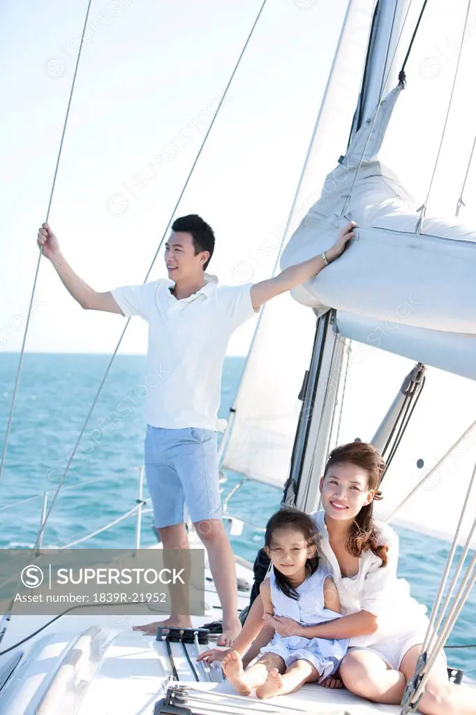 Happy Family On a Sailboat
