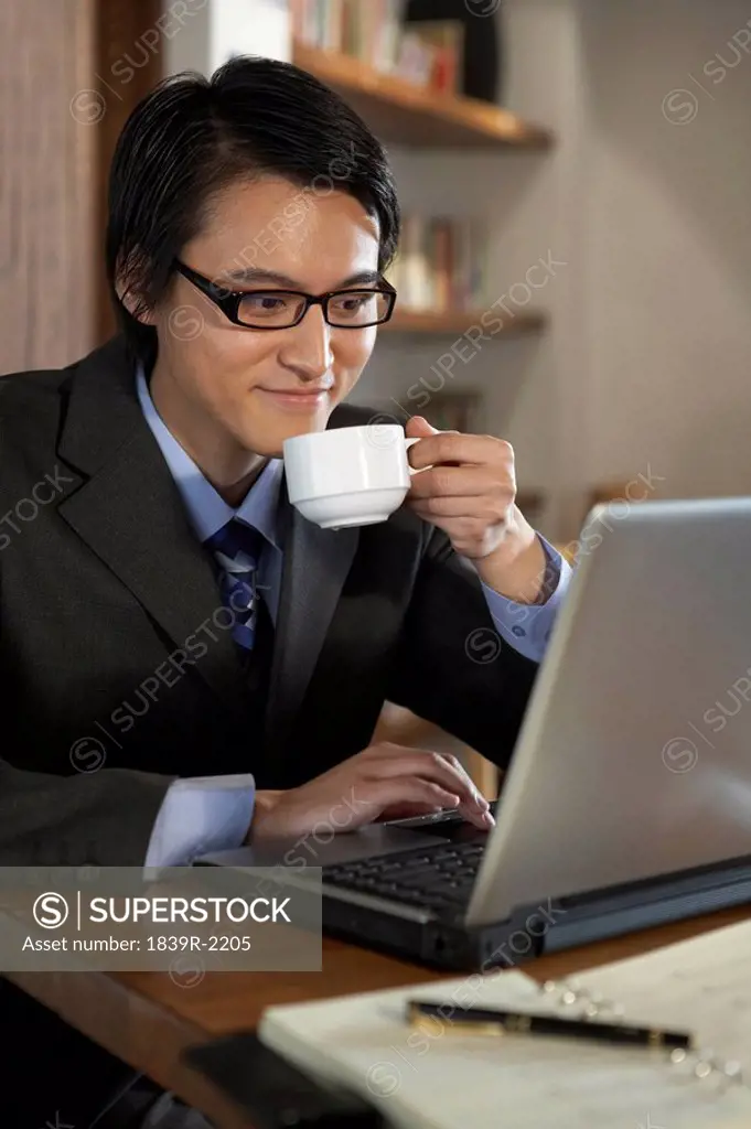 Businessman Using Laptop Computer