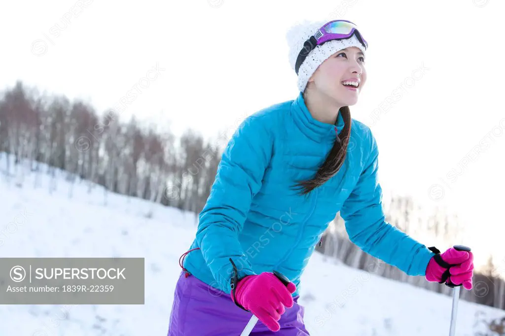 Young woman in skiing resort