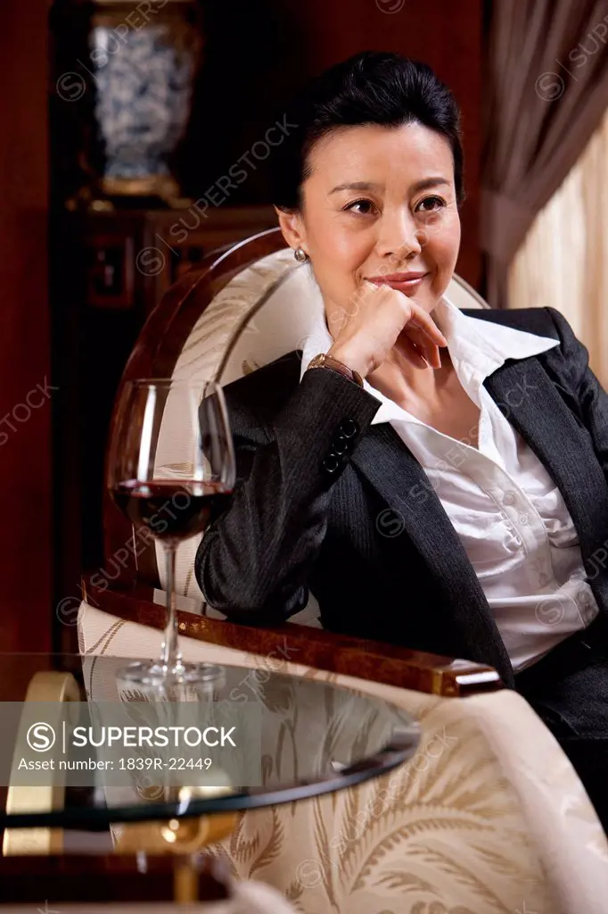 Mature businesswoman in a luxurious room