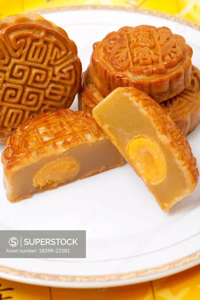 Stacks of Moon Cakes, One Cut to Reveal Filling