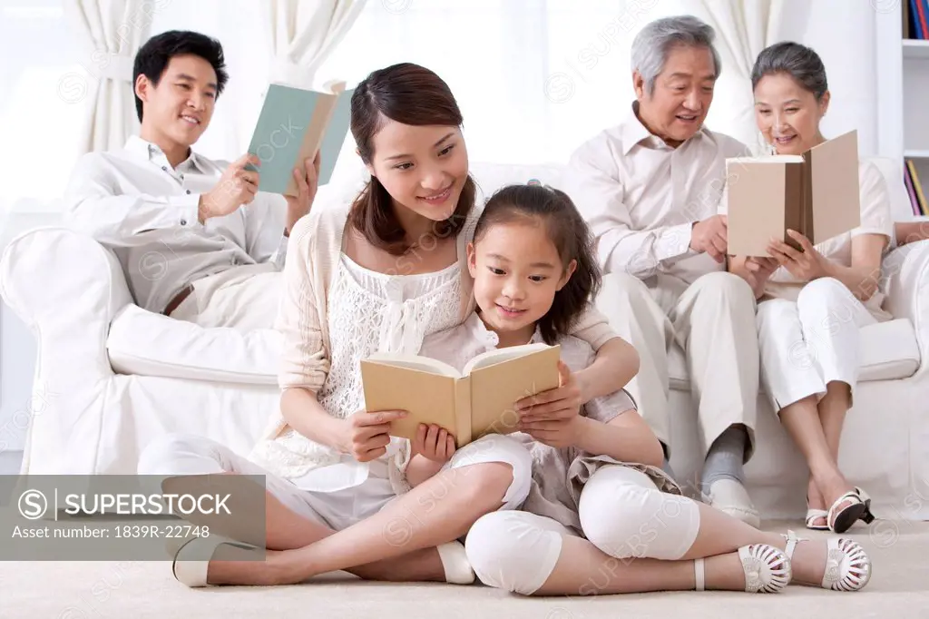 Happy Family Reading Together