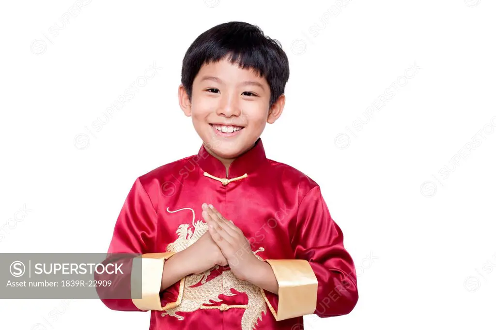 Young Boy Dressed In Traditional Chinese Clothing