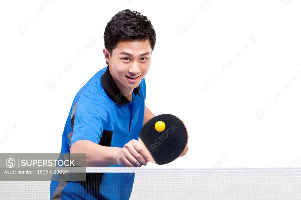 Table tennis player playing
