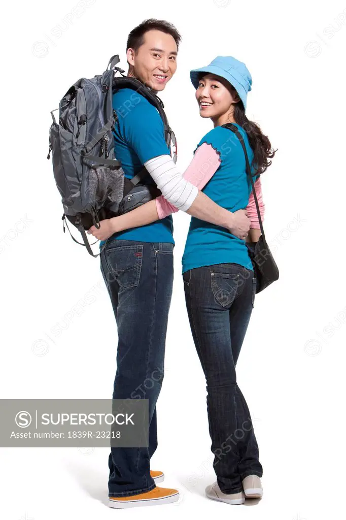 Portrait of young couple travelling