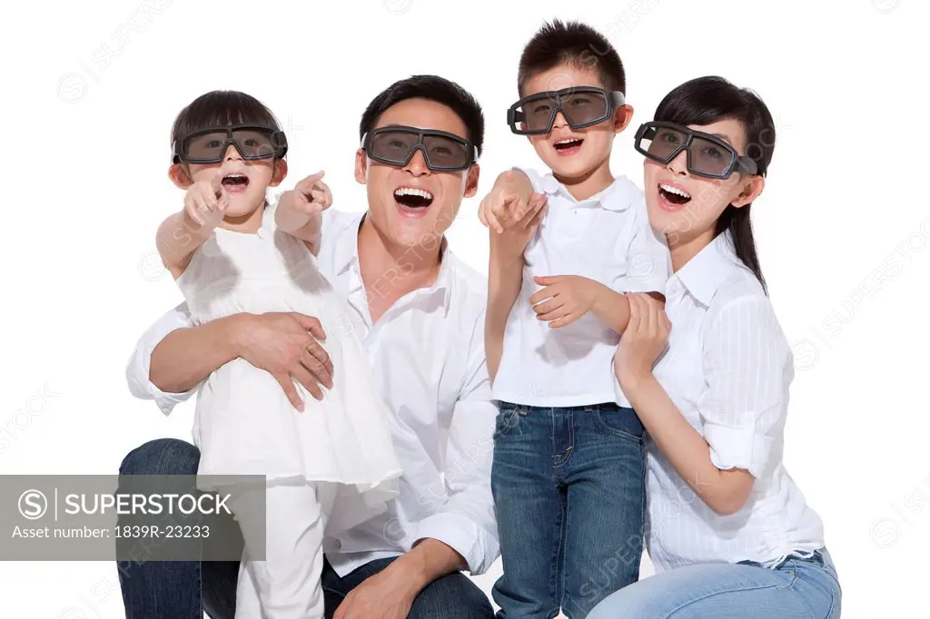 Happy family watching 4D movies
