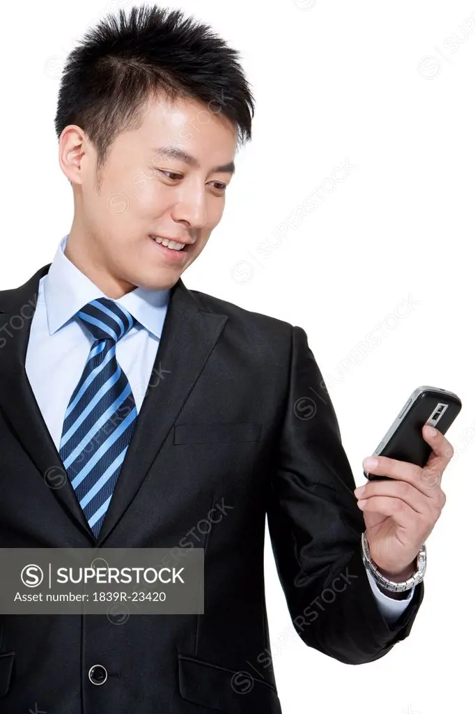 Businessman holding a mobile phone