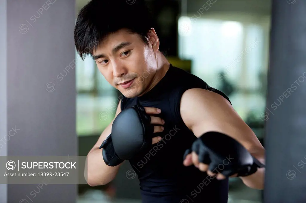 Mid_Adult Man Boxing