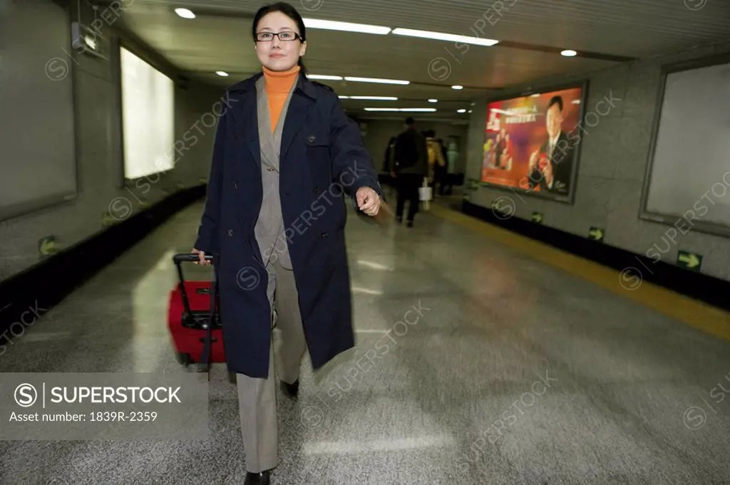 Women Walking Towards Subway Platform