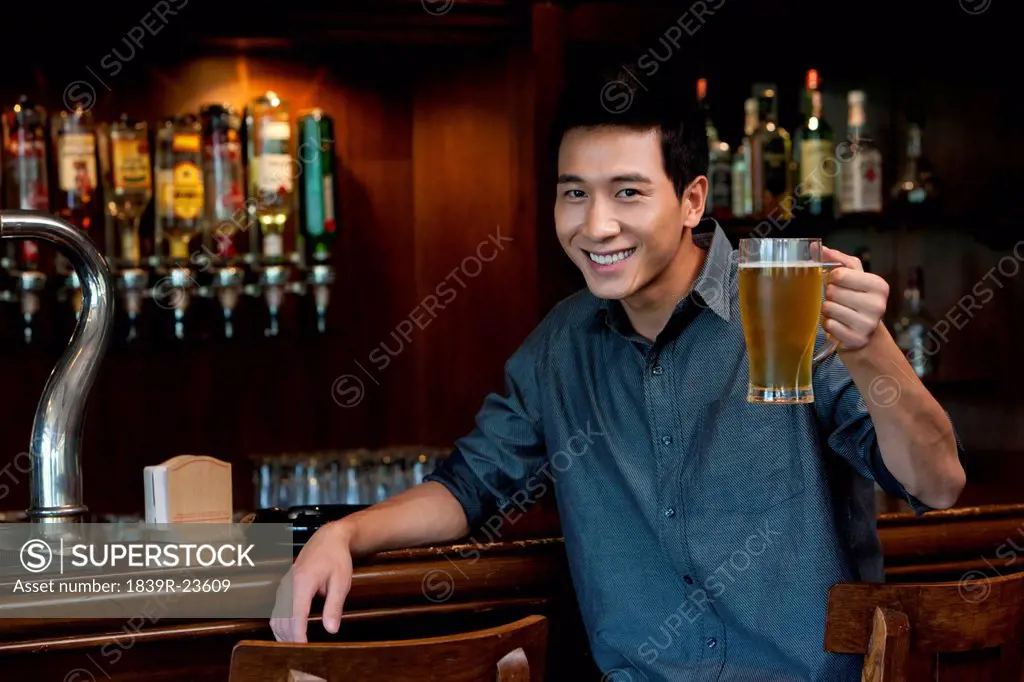 A Man Relaxing at a Bar