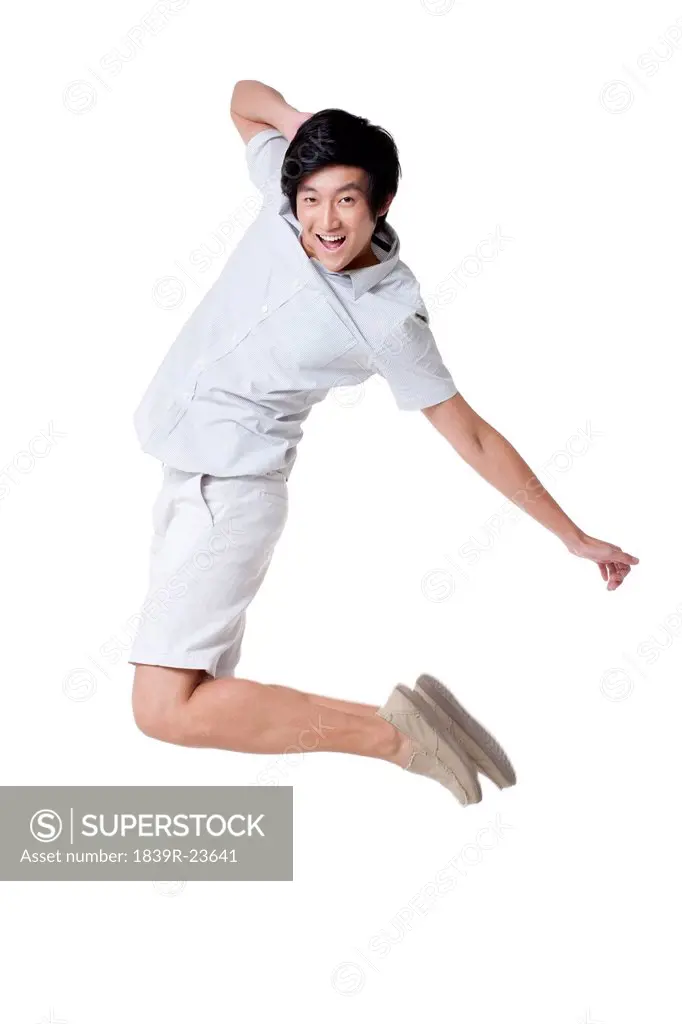 Young Man Jumping In the Air