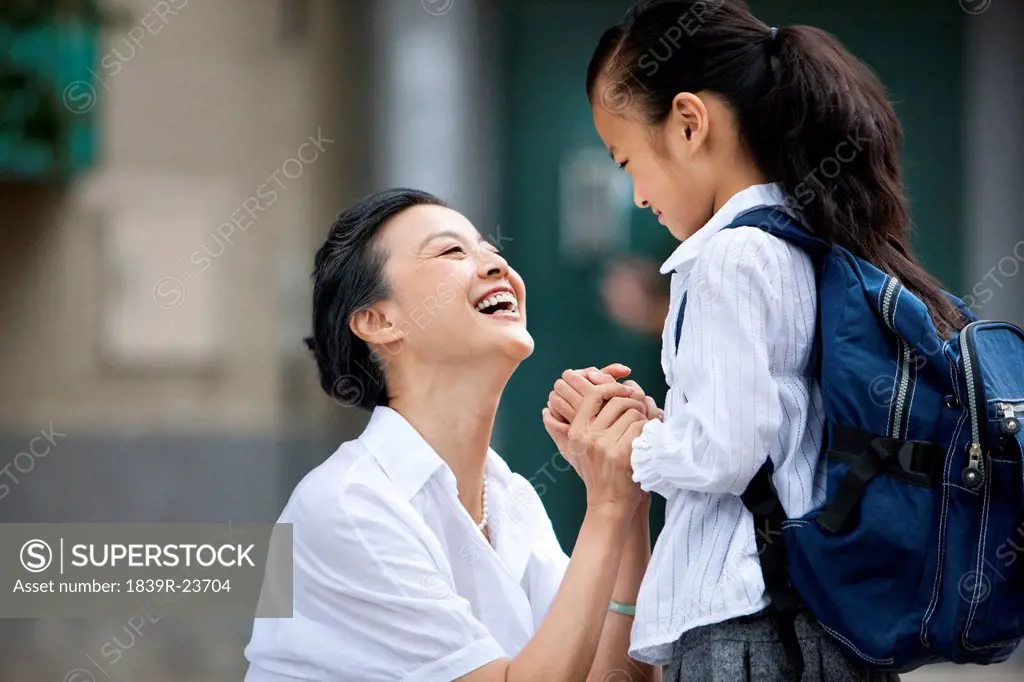 Chinese schoolgirl with grandmother