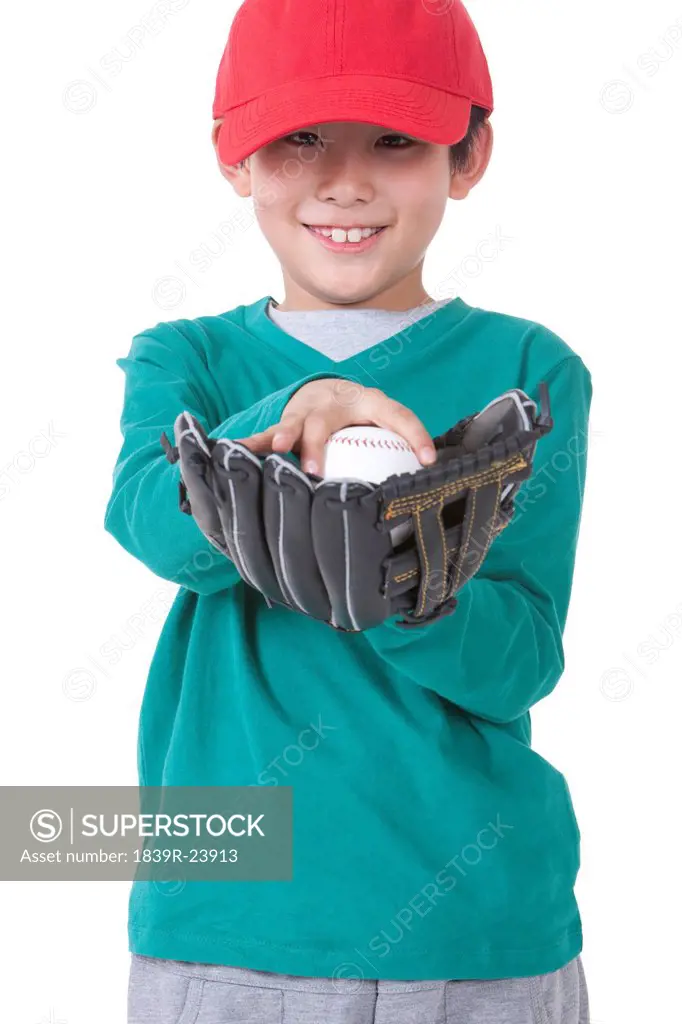 Little boy with baseball gear