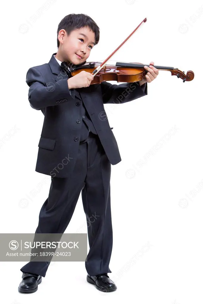 Little boy playing the violin