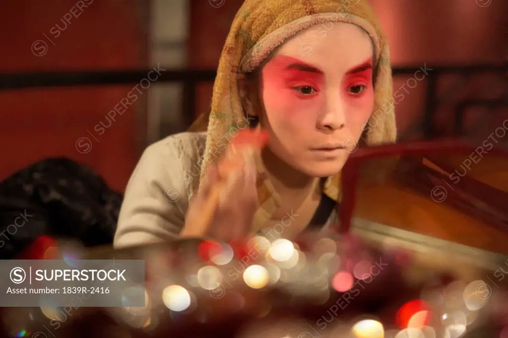 Woman Applying Make_Up With Brush