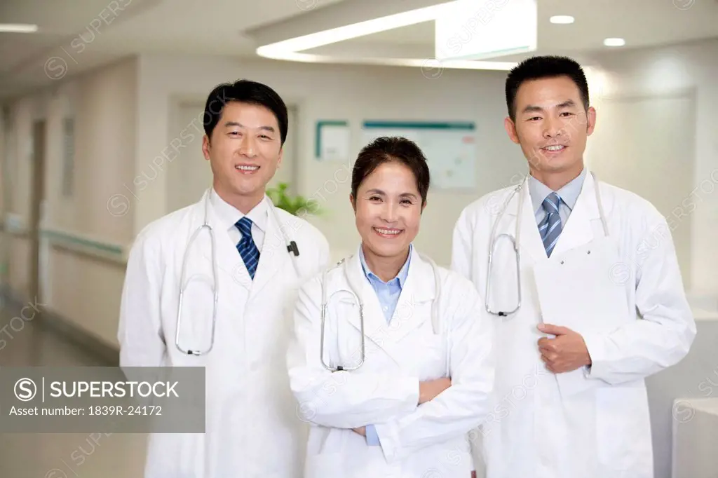A team of smiling doctors