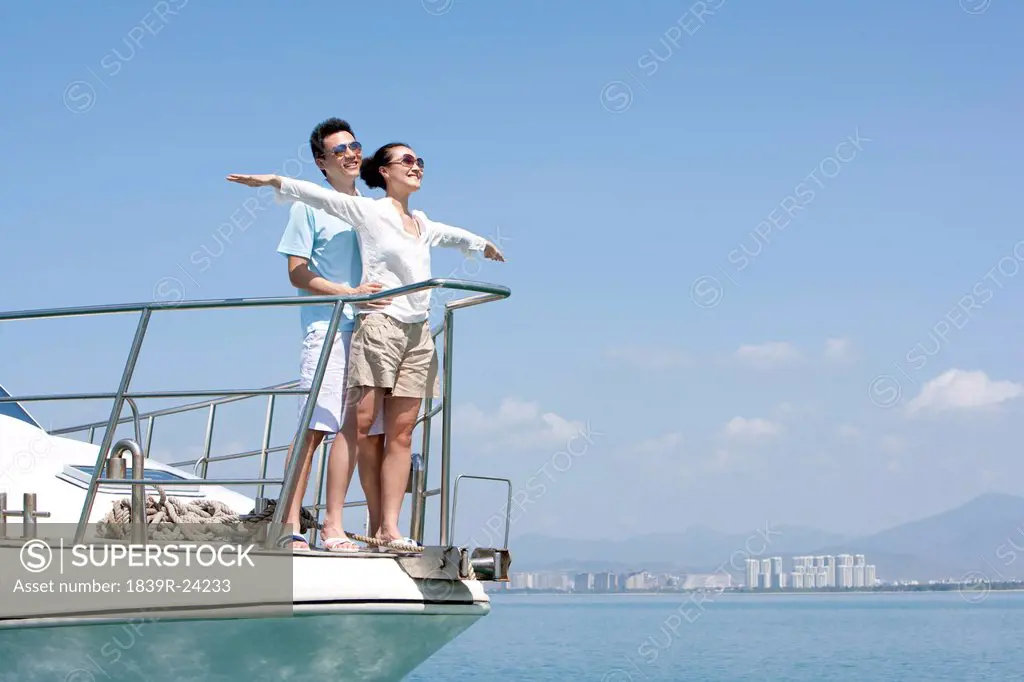 Couple Enjoying the View from the Yacht Deck