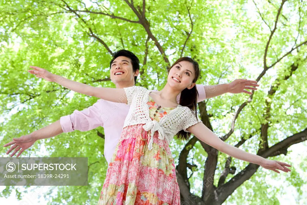 Happy Young Couple at the Park